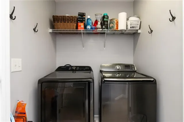 a utility room with dryer and washer