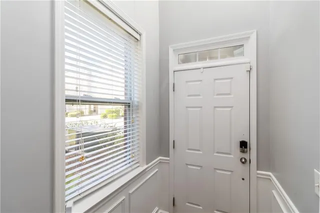 a view of an entryway with a window