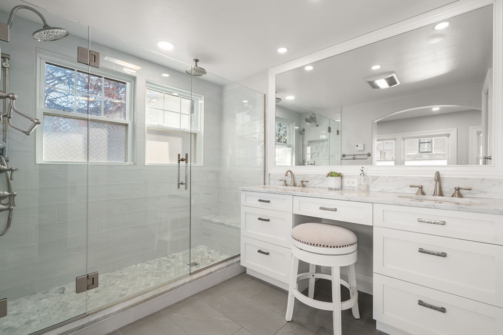 3 Ocean Street Boston, MA 02124 - Photo 24 of 42 a bathroom with a sink a toilet and shower