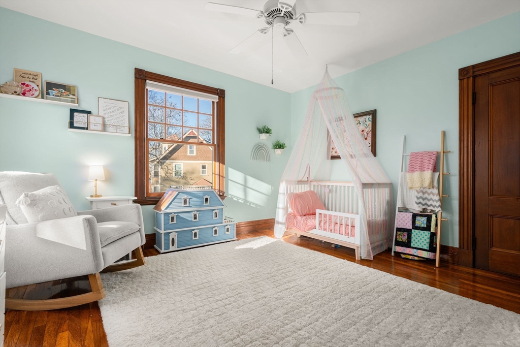 3 Ocean Street Boston, MA 02124 - Photo 31 of 42 a bedroom with furniture and a large window