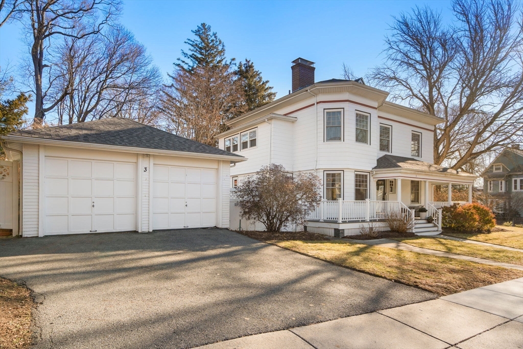 3 Ocean Street Boston, MA 02124 - Photo 38 of 42 a front view of a house with a yard