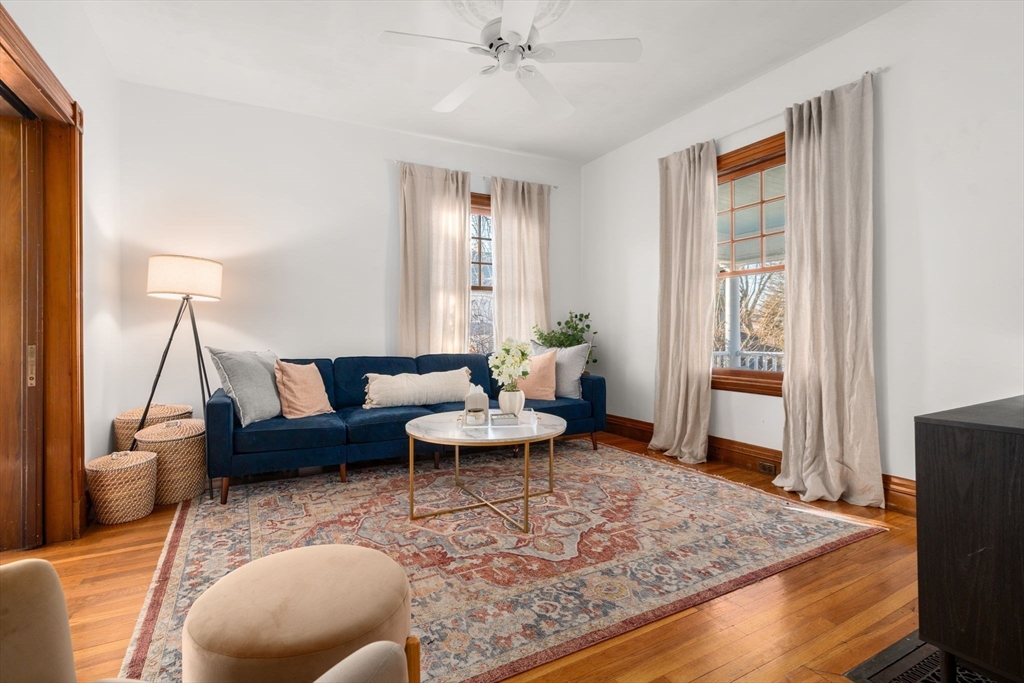 3 Ocean Street Boston, MA 02124 - Photo 5 of 42 a living room with furniture and a rug