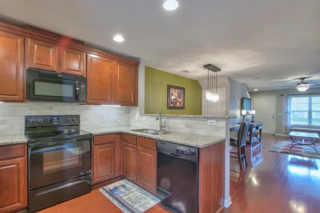 a kitchen with granite countertop lots of counter top space