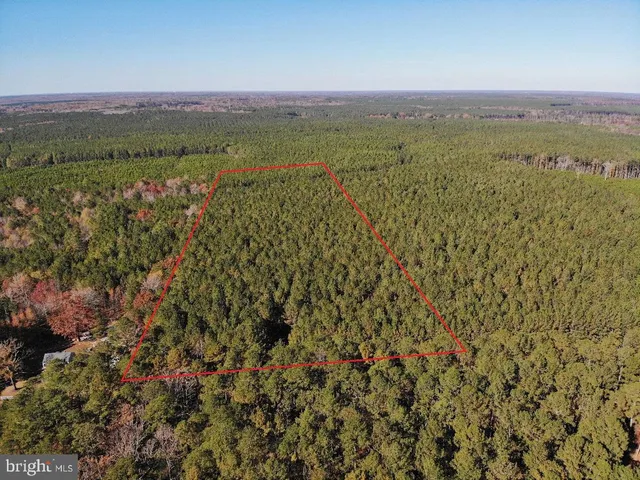 a view of an ocean and a mountain