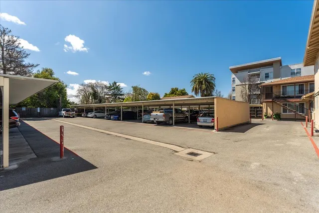 a view of a street with sitting area