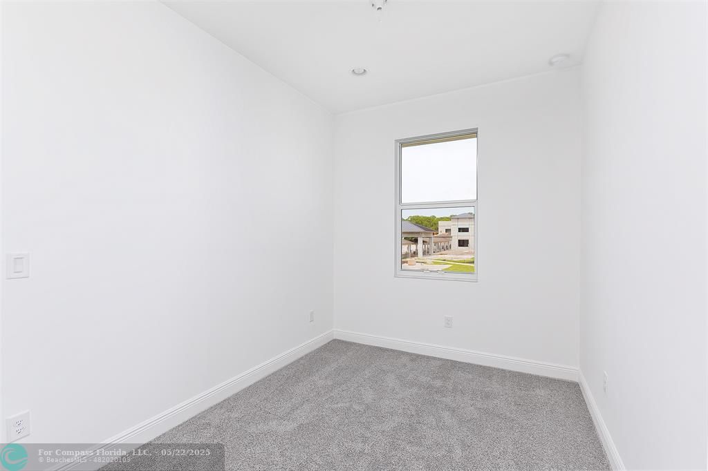 6965 Pines Circle, Unit 29 Pompano Beach, FL 33073 - Photo 24 of 27 a view of an empty room