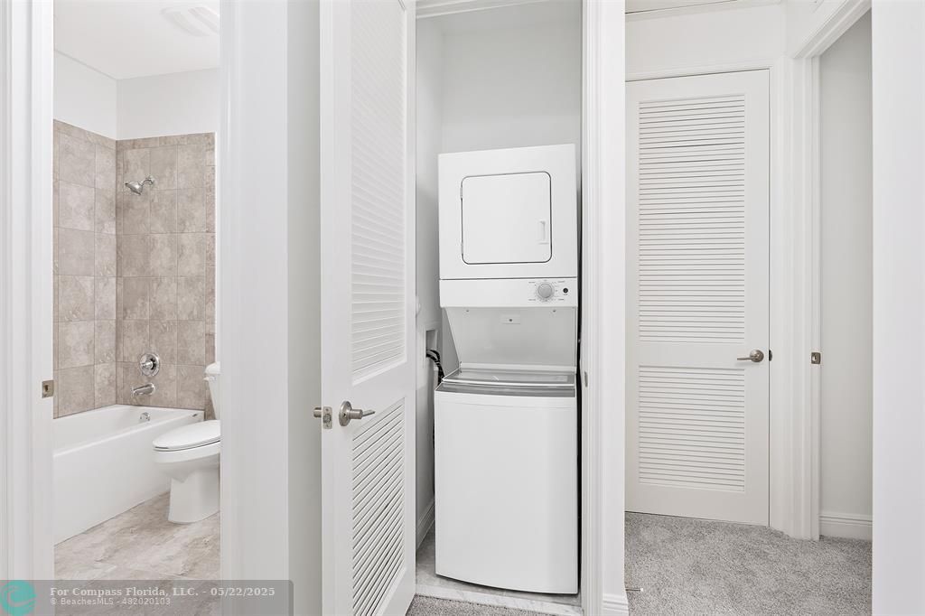6965 Pines Circle, Unit 29 Pompano Beach, FL 33073 - Photo 25 of 27 a bathroom with a granite countertop sink a toilet and shower