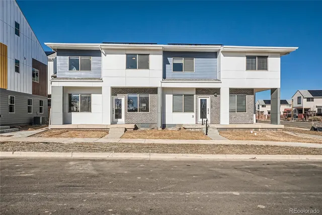 a house that has a lots of windows in it