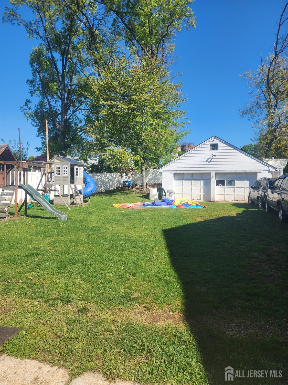 215 Summit Avenue Fords, NJ 08863 - Photo 3 of 15 a front view of a house with garden