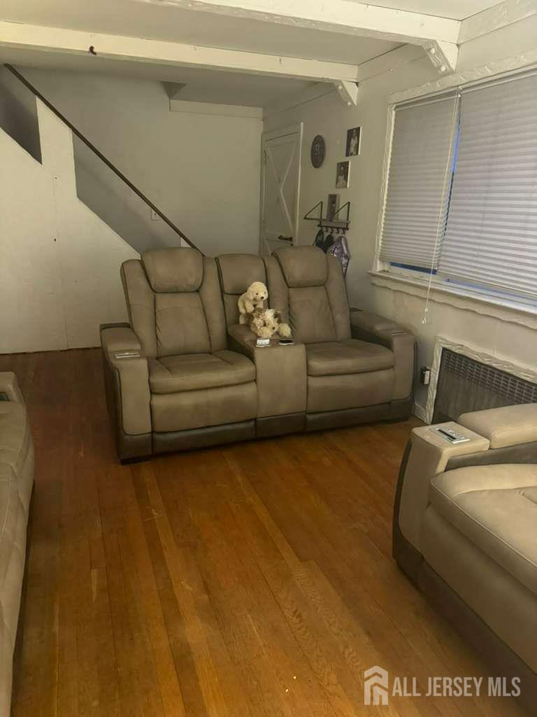 215 Summit Avenue Fords, NJ 08863 - Photo 7 of 15 a living room with furniture and a couch