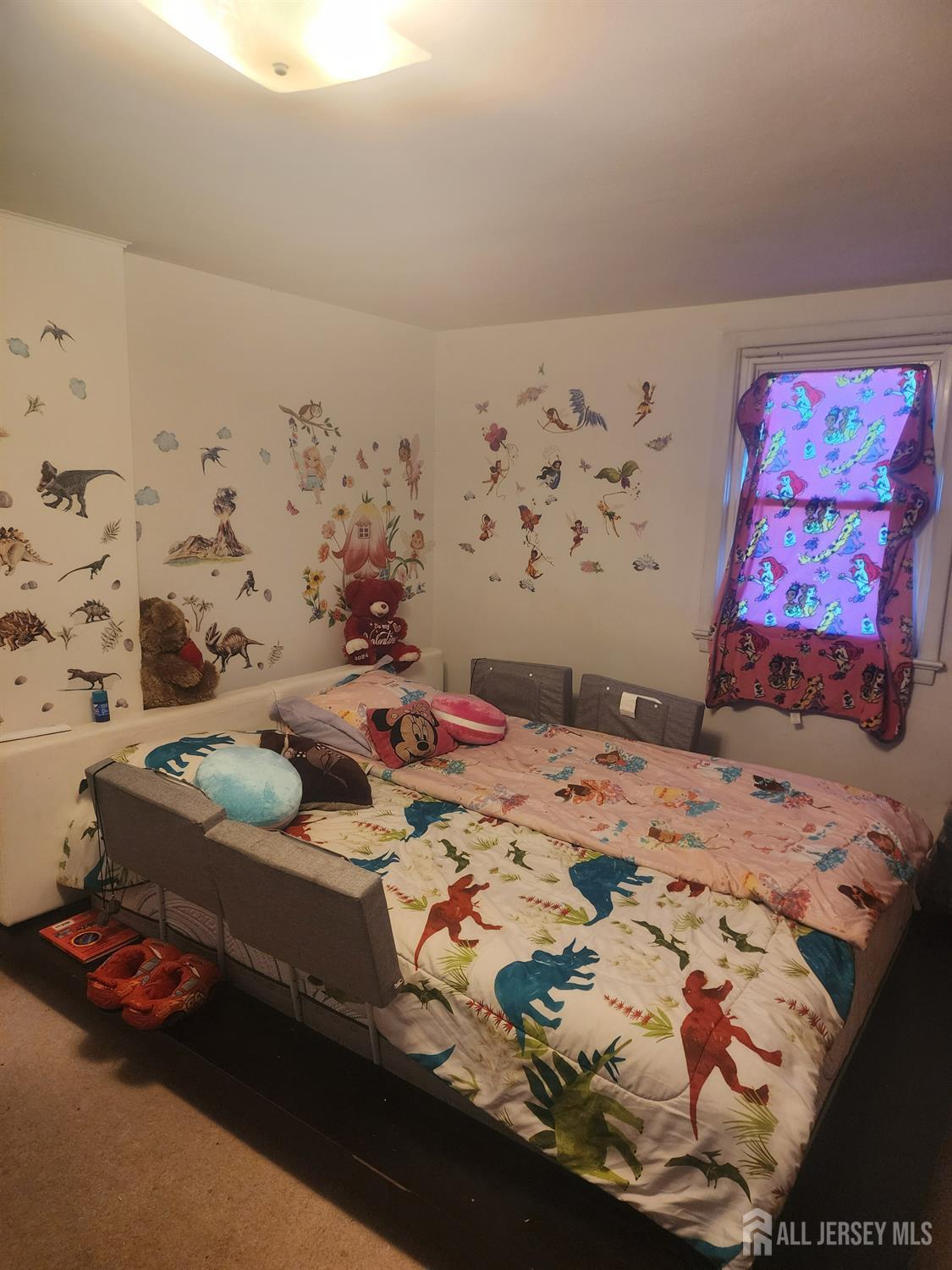 215 Summit Avenue Fords, NJ 08863 - Photo 9 of 15 a bedroom with a bed and a wall painting
