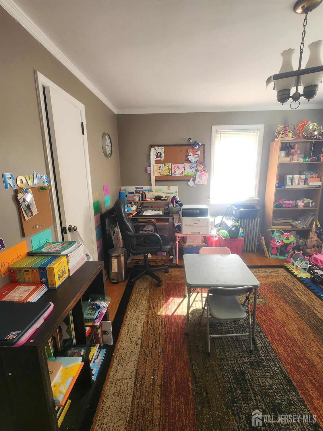 215 Summit Avenue Fords, NJ 08863 - Photo 10 of 15 a workspace with furniture hardwood and a window