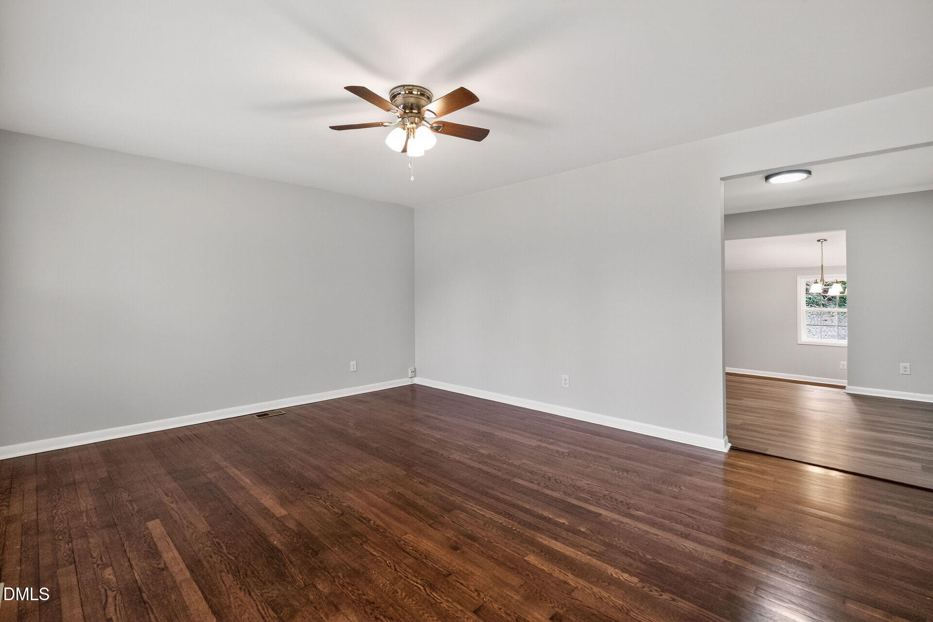 517 Cooper Road Raleigh, NC 27610 - Photo 8 of 29 FAMILY ROOM LEADING INTO KITCHEN
