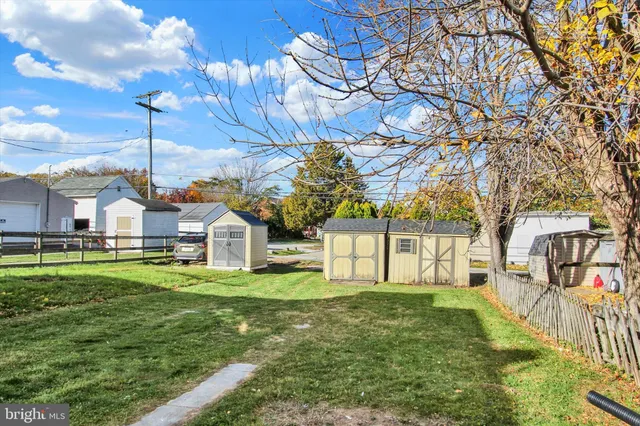 a view of a house with a big yard
