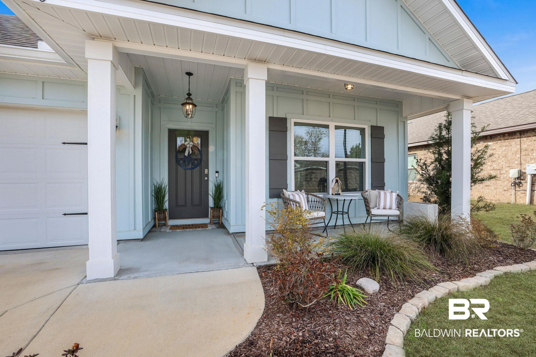 9056 Impala Drive Foley, AL 36535 - Photo 1 of 22 Doorway to property with a porch