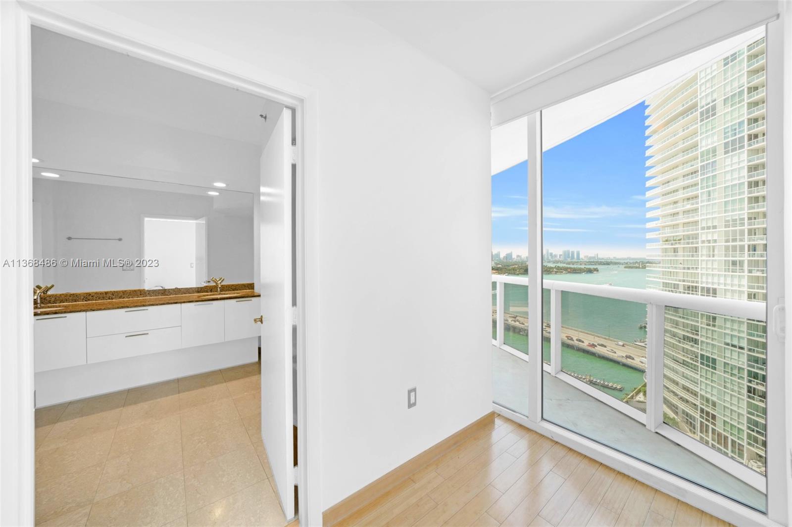 400 Alton Road, Unit 2002 Miami Beach, FL 33139 - Photo 12 of 25 a view of washer and dryer