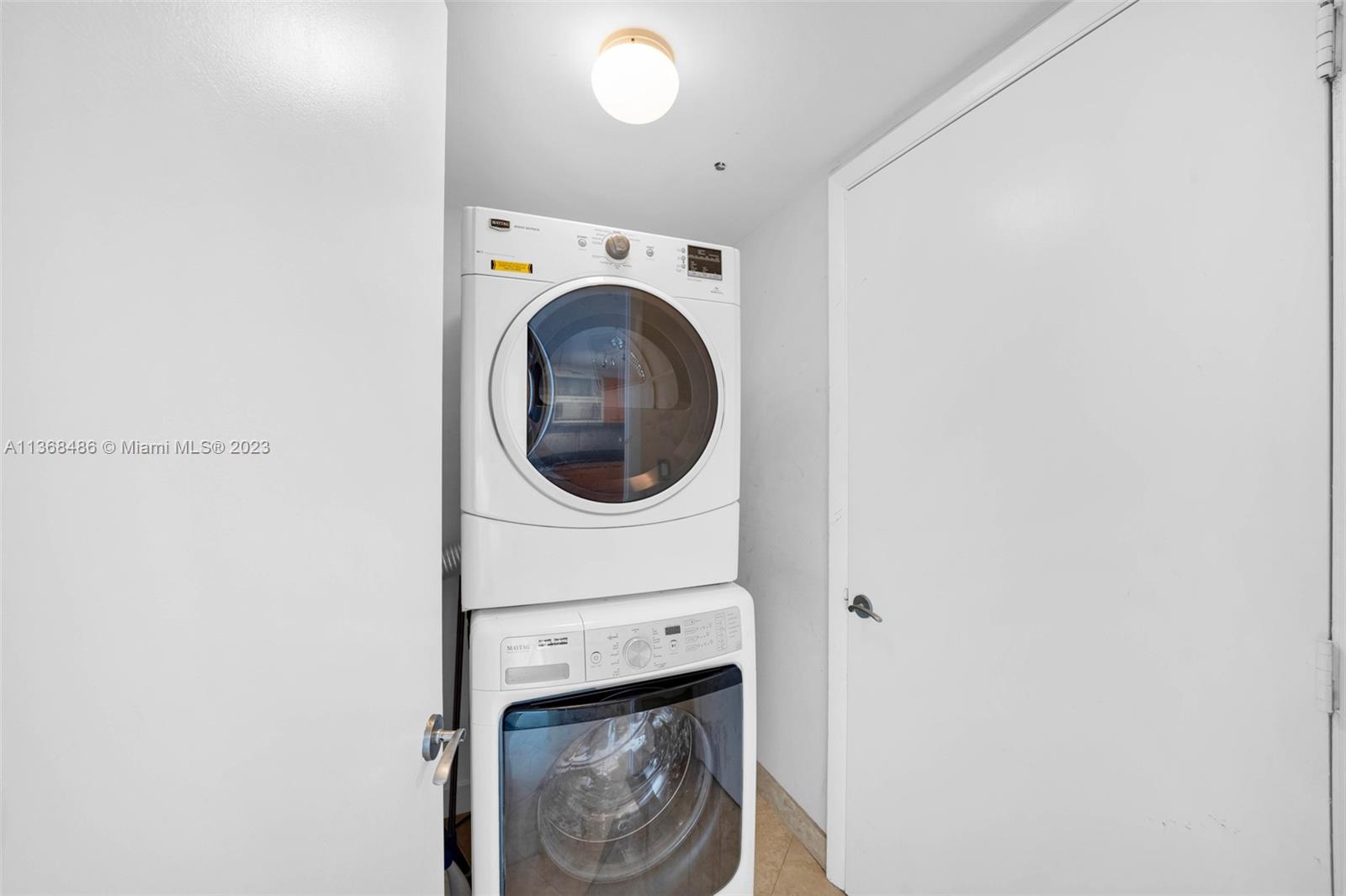 400 Alton Road, Unit 2002 Miami Beach, FL 33139 - Photo 19 of 25 a close up view of a washer and dryer