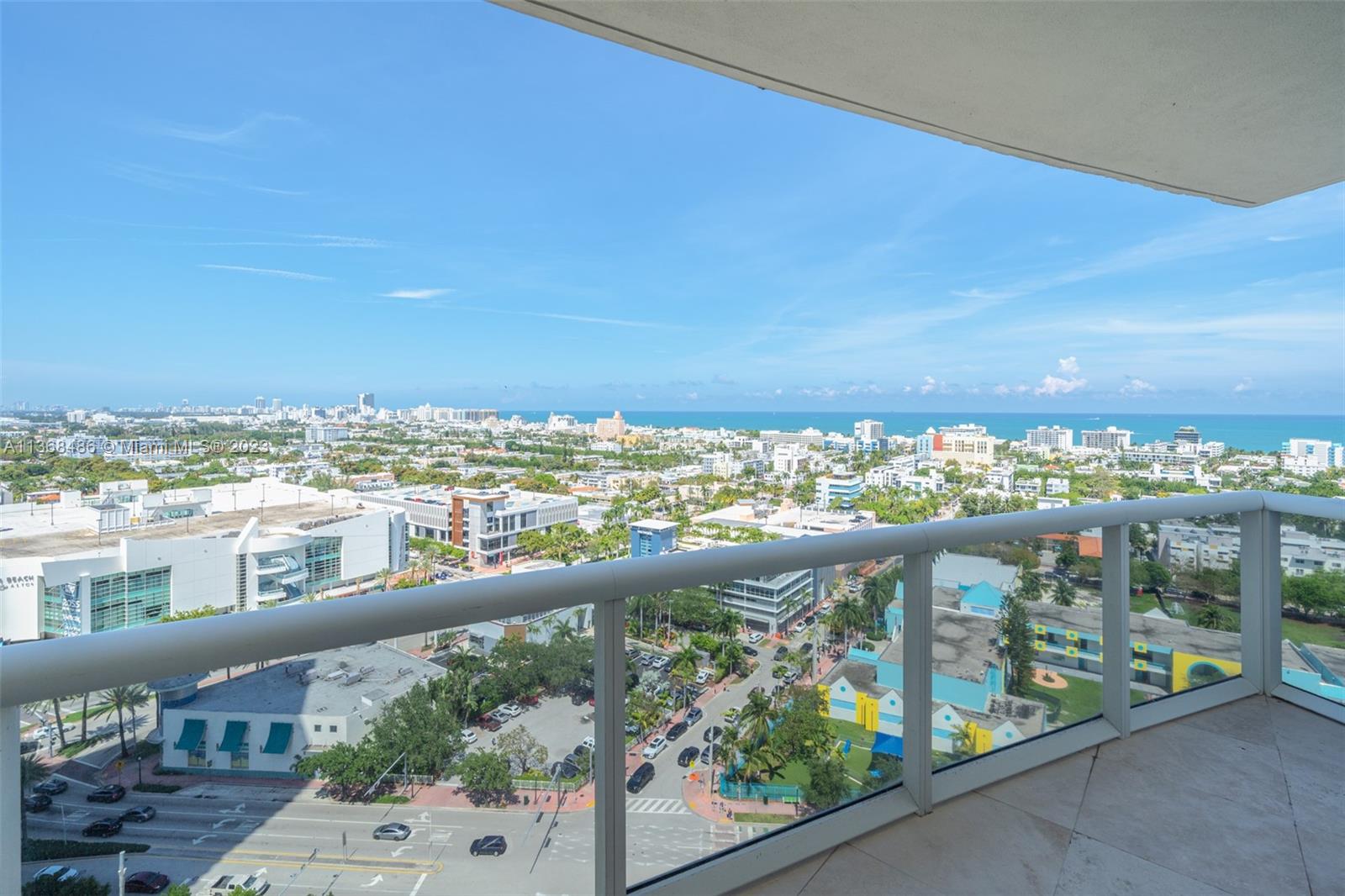 400 Alton Road, Unit 2002 Miami Beach, FL 33139 - Photo 5 of 25 a view of city from a balcony