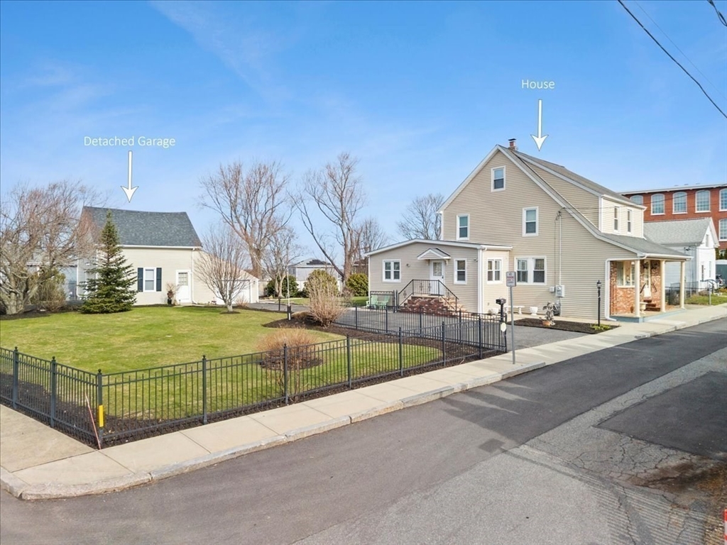 25 Winward Street Fall River, MA 02724 - Photo 2 of 42 a view of a house with a swimming pool