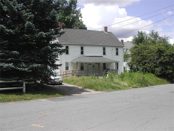 65-67 Diamond Street Walpole, MA 02081 - Photo 1 of 2 front view of a house with a yard