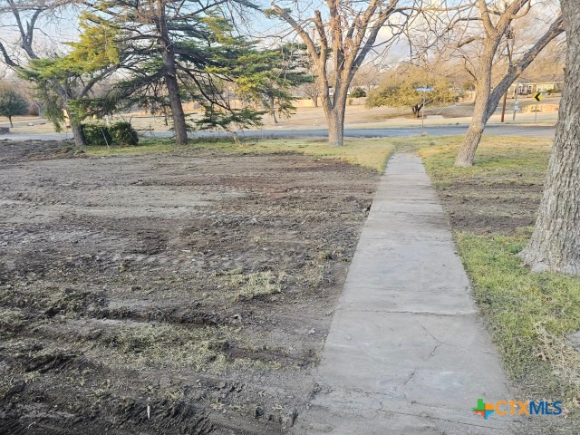 920 North 4th Street Temple, TX 76501 - Photo 6 of 10 a sign board with yard and trees