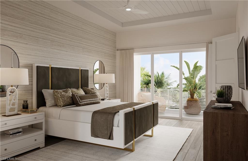201 8th Street South, Unit 311 Naples, FL 34102 - Photo 12 of 12 a bedroom with a large bed and a large window