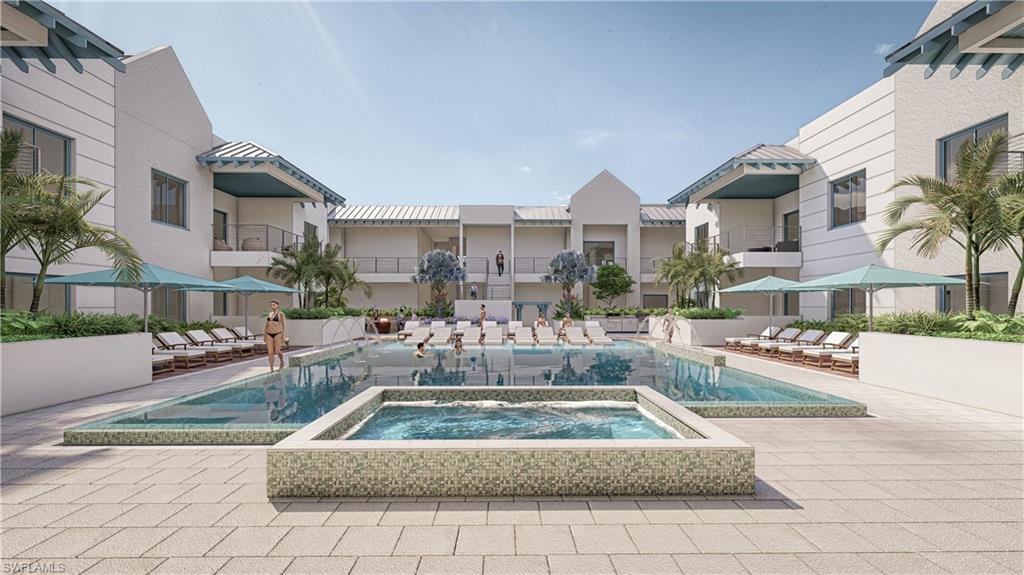 201 8th Street South, Unit 311 Naples, FL 34102 - Photo 4 of 12 a front view of a house with outdoor seating