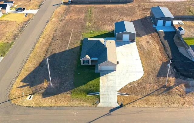 swimming pool view with a sitting space