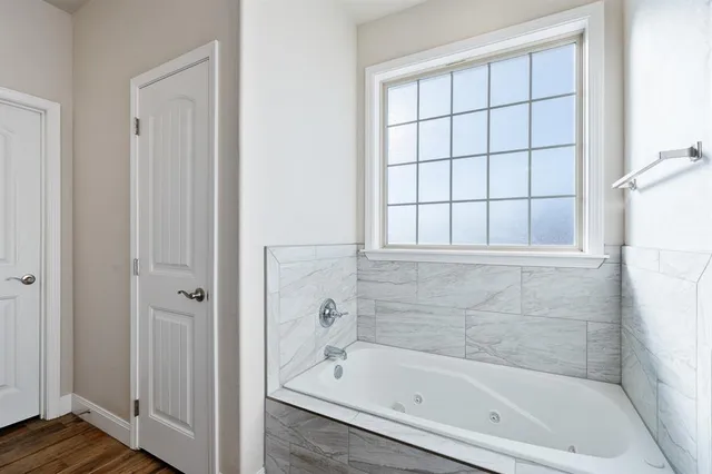 a bathroom with a bathtub