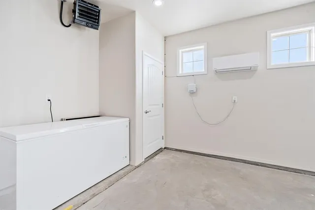 a view of a room with racks on the wall