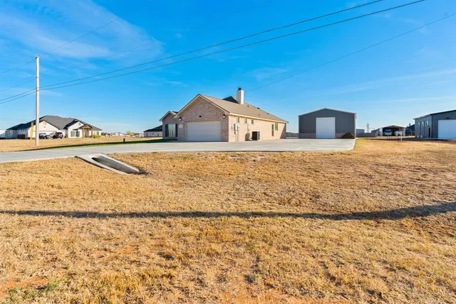 a house with trees in the background