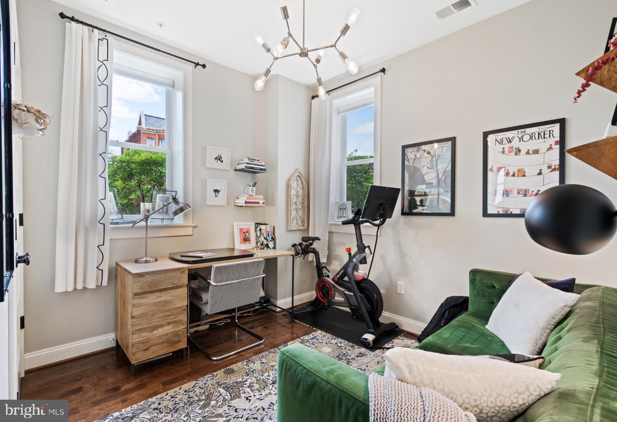 1249 Kenyon Street Northwest, Unit 2 Washington, DC 20010 - Photo 14 of 22 Chic home office with vibrant accents.