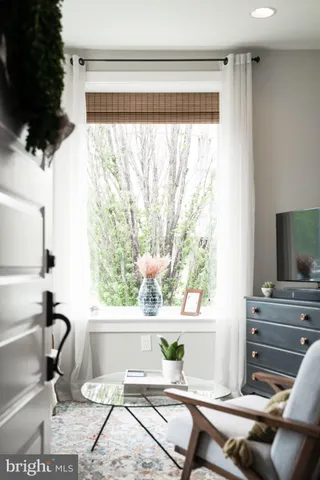 a living room with a couch and a flat screen tv