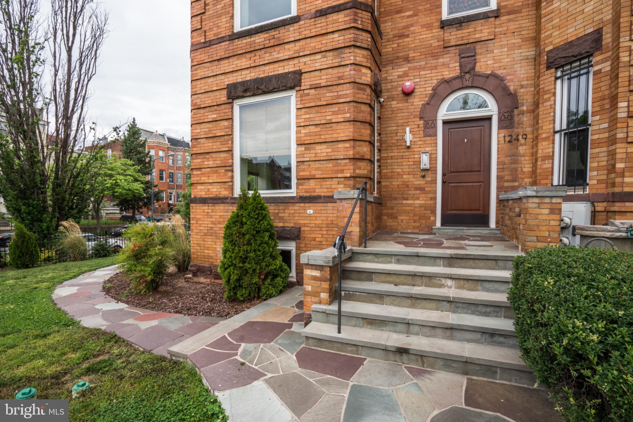 1249 Kenyon Street Northwest, Unit 2 Washington, DC 20010 - Photo 2 of 22 Charming brick facade with inviting entrance.