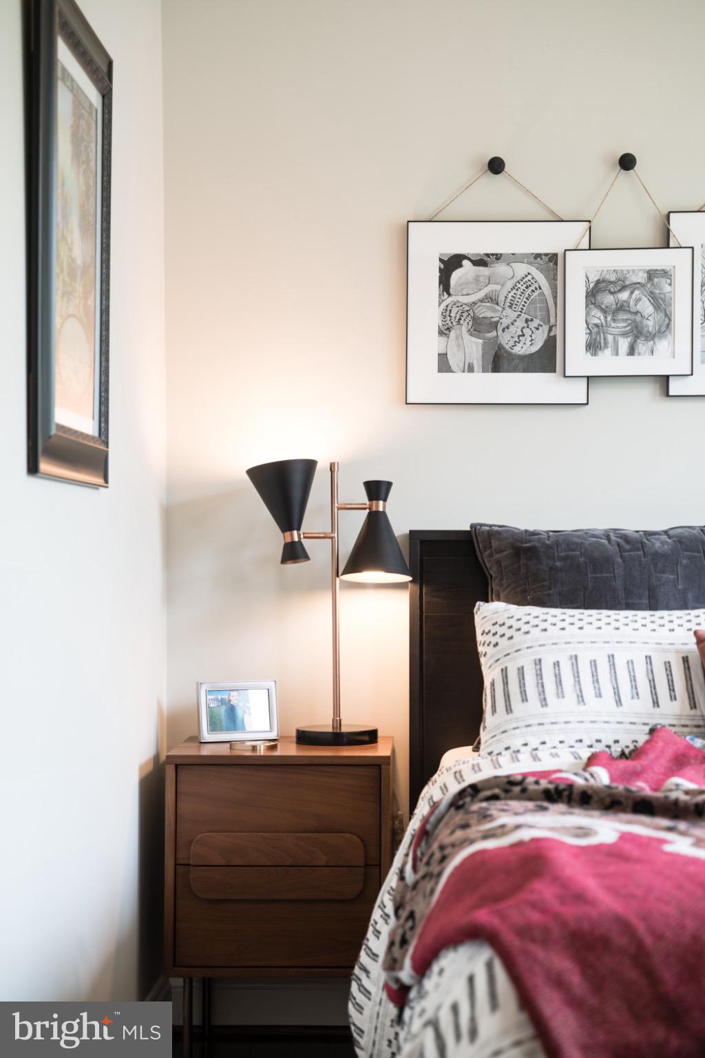 1249 Kenyon Street Northwest, Unit 2 Washington, DC 20010 - Photo 22 of 22 Chic bedroom with modern accents and art.