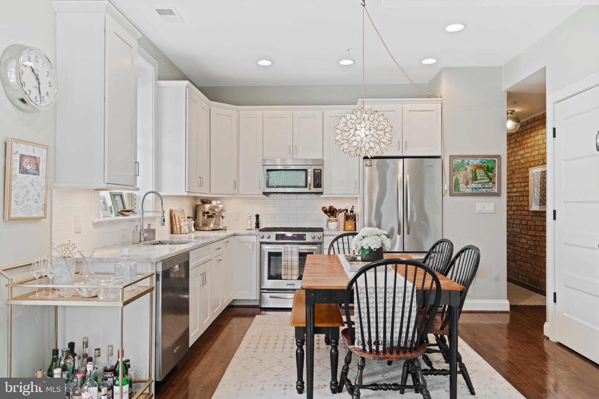 1249 Kenyon Street Northwest, Unit 2 Washington, DC 20010 - Photo 6 of 22 Charming kitchen with modern elegance.