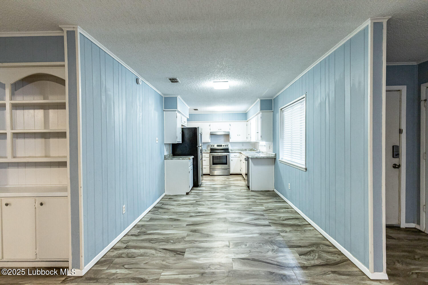 4305 52nd Street, Unit A Lubbock, TX 79413 - Photo 15 of 38 a view of kitchen with wooden floor