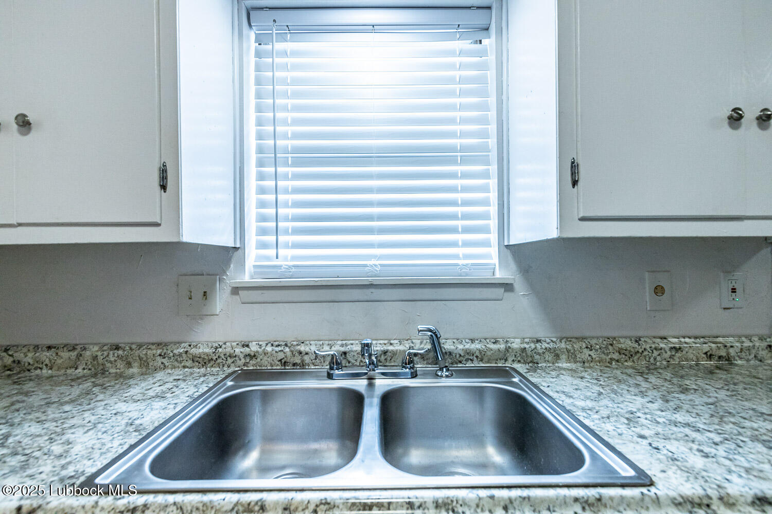 4305 52nd Street, Unit A Lubbock, TX 79413 - Photo 20 of 38 a close view of sink and tap