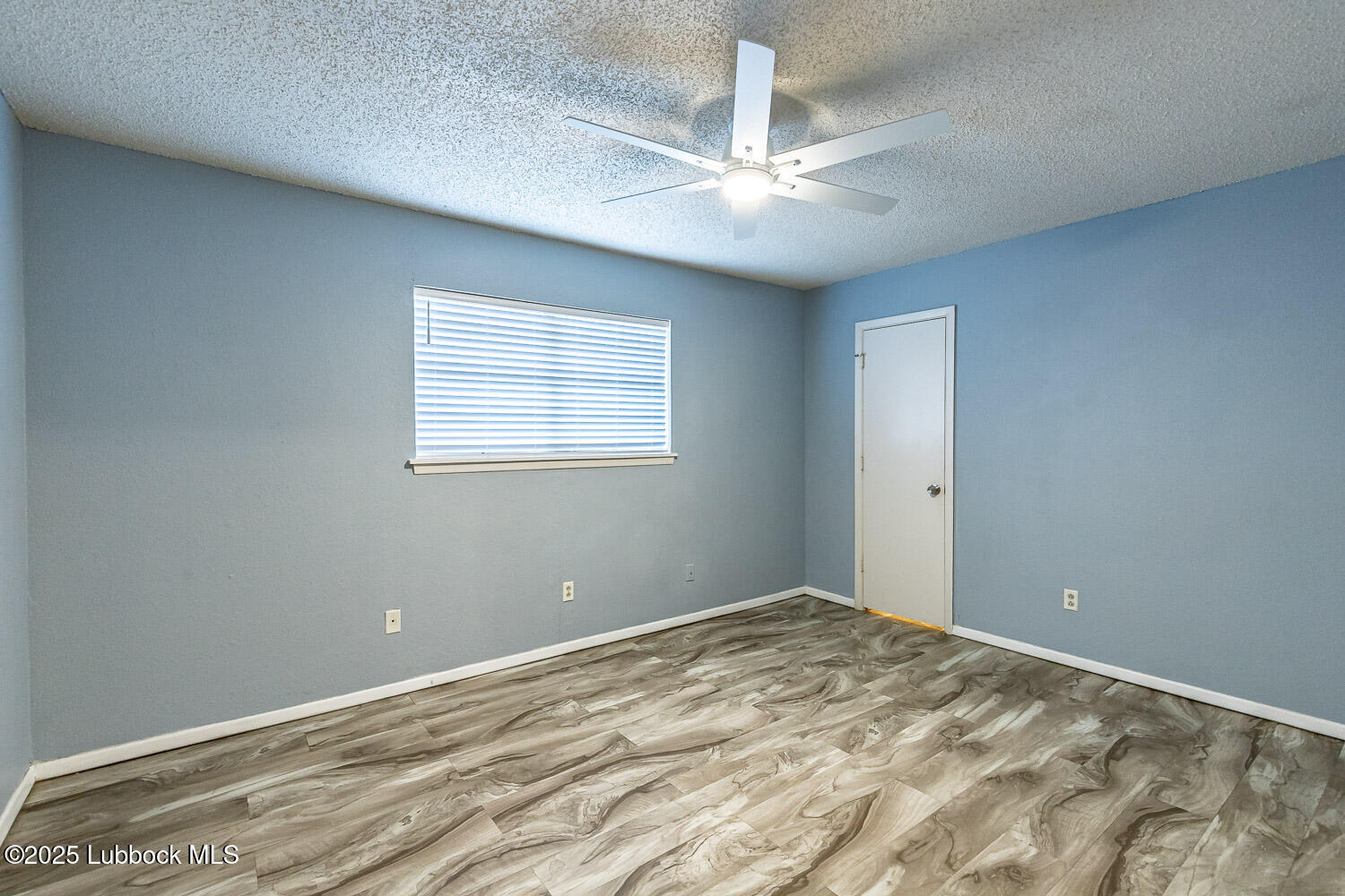 4305 52nd Street, Unit A Lubbock, TX 79413 - Photo 25 of 38 a view of an empty room with a window