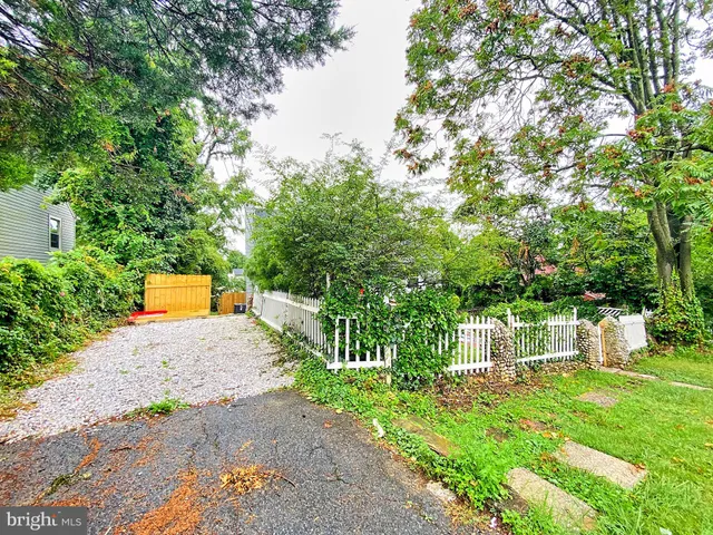 a view of a cafe with sitting area