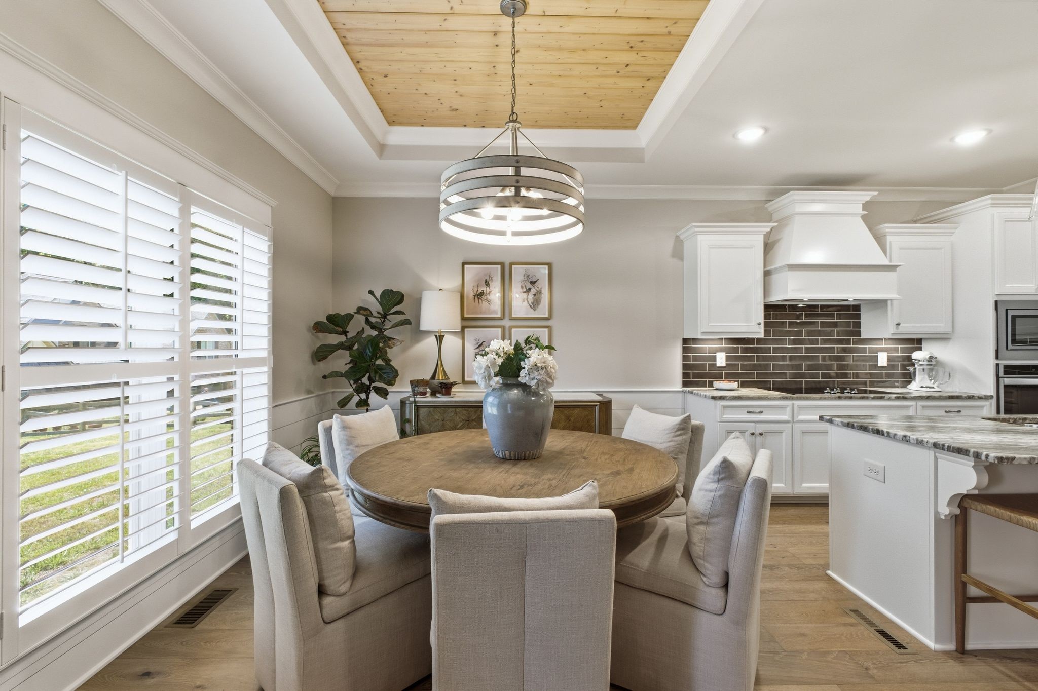 17845 Highway 76 East Springfield, TN 37172 - Photo 24 of 55 a kitchen with stainless steel appliances a dining table chairs and chandelier