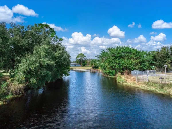 a view of a lake with houses