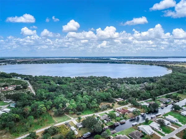 a view of a lake in middle of a city