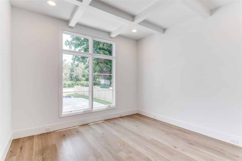 7519 Taos Road Dallas, TX 75209 - Photo 18 of 40 Empty room featuring light wood finished floors, beamed ceiling, coffered ceiling, and recessed lighting