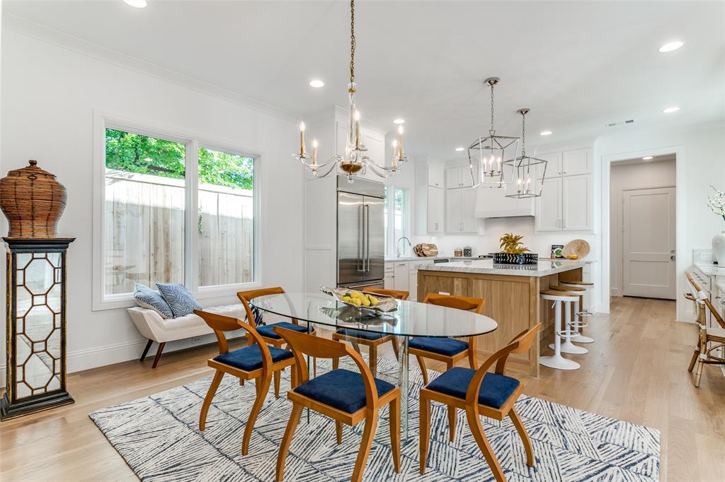 7519 Taos Road Dallas, TX 75209 - Photo 7 of 40 Dining space with light wood-type flooring, recessed lighting, ornamental molding, and a chandelier