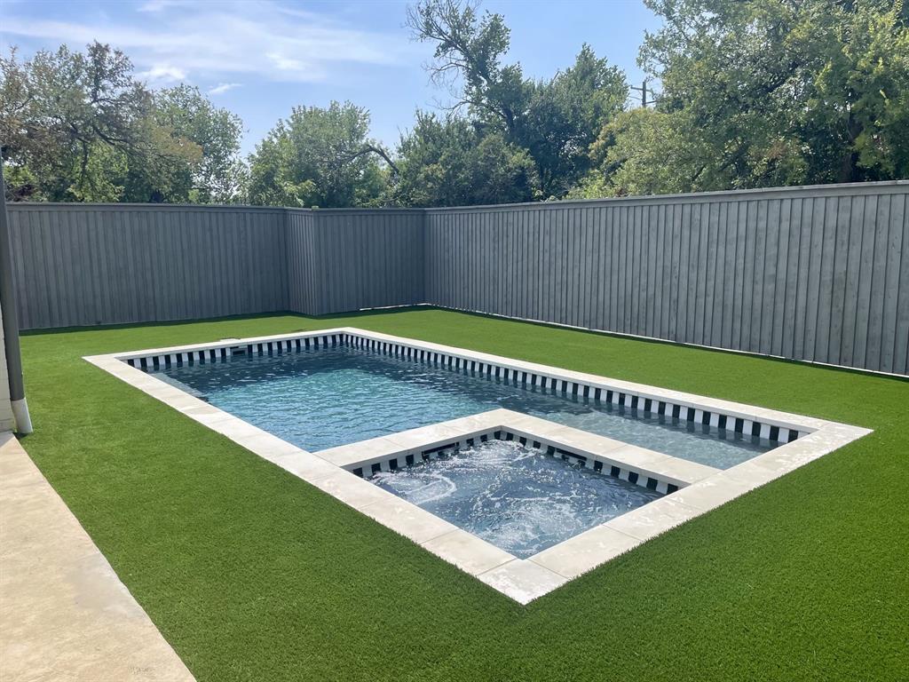 7519 Taos Road Dallas, TX 75209 - Photo 10 of 40 View of swimming pool with a patio, a fenced backyard, and a pool with connected hot tub