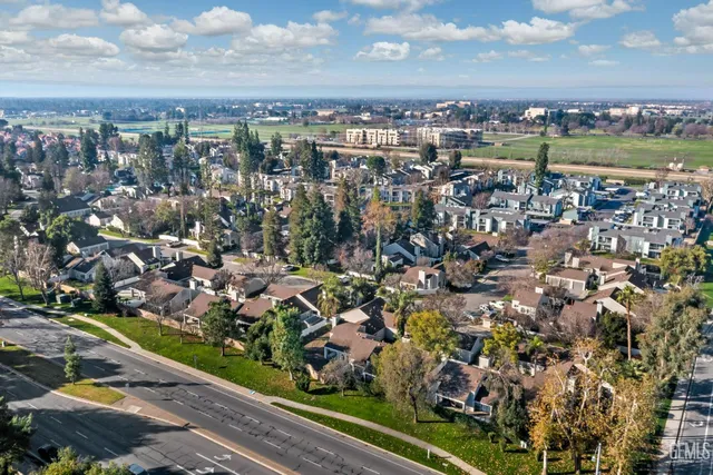 an aerial view of a city with lots of residential buildings