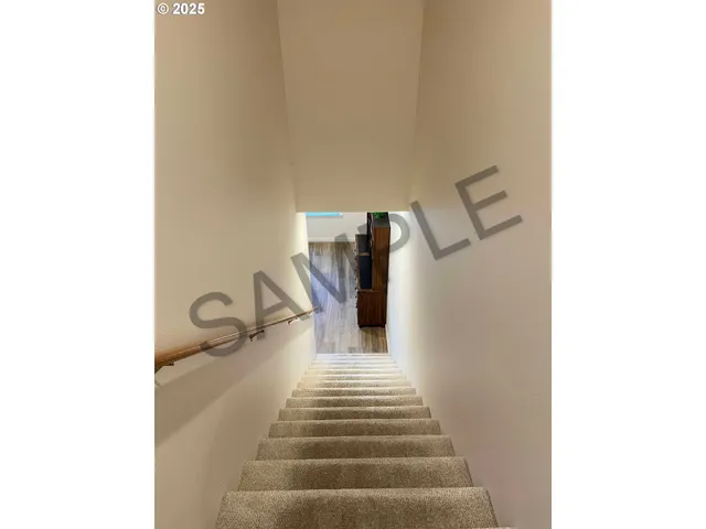 a kitchen with stainless steel appliances granite countertop a refrigerator stove and microwave