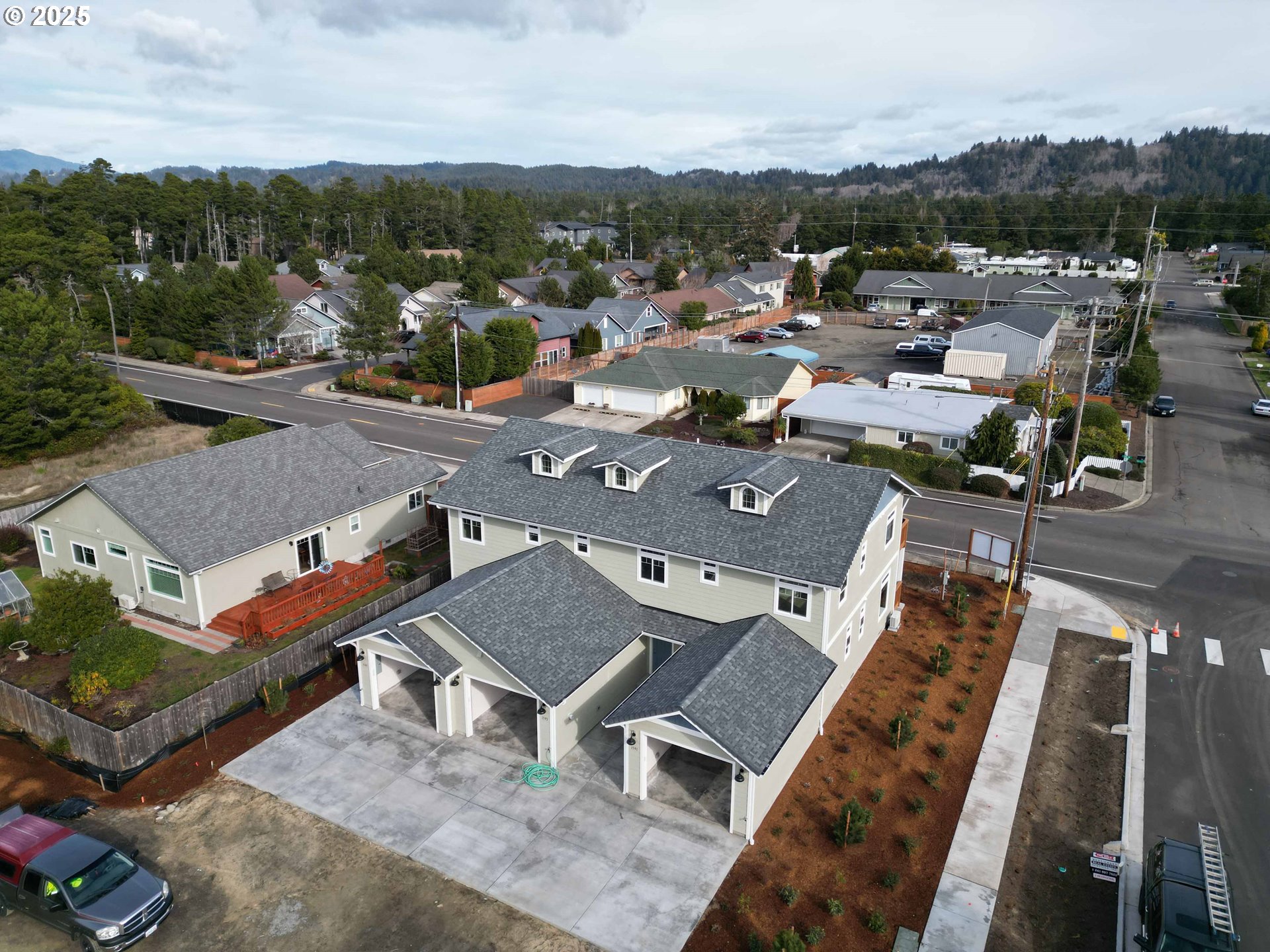 1575 37th Street Florence, OR 97439 - Photo 10 of 48 an aerial view of a city with lots of residential buildings