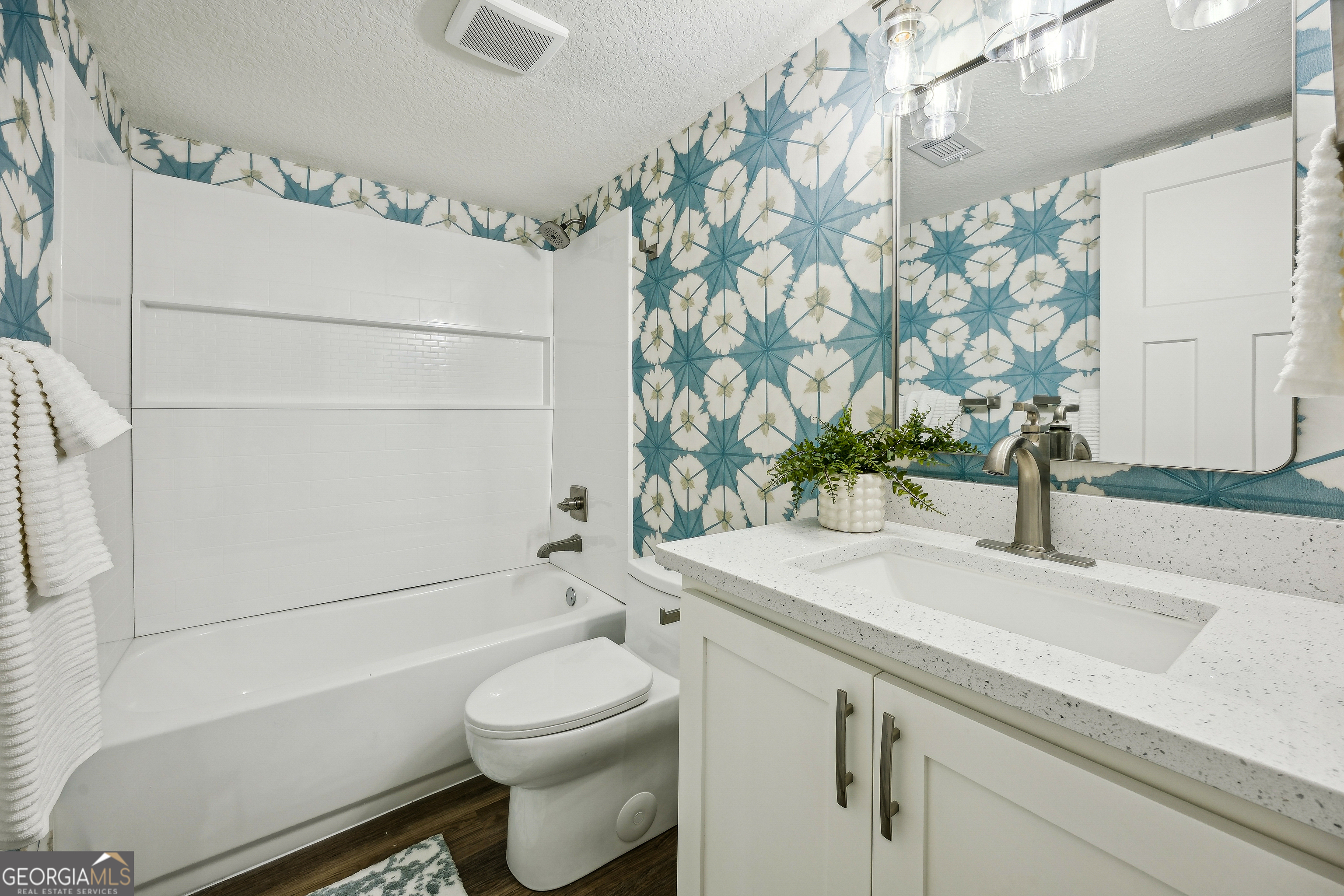 182 Clarks Bluff Road Kingsland, GA 31548 - Photo 19 of 27 a bathroom with a sink a toilet and shower